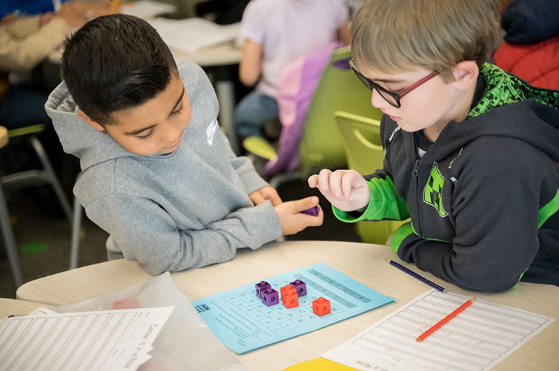 K-5 students engaging in math